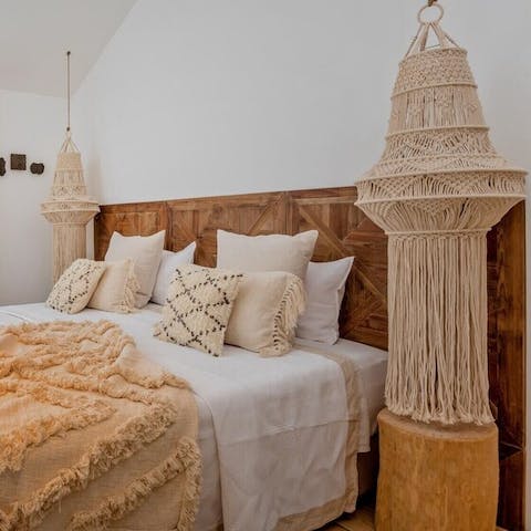 Sleep in boho splendour with bedrooms adorned with macrame and throws