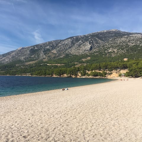 Stay on the island of Brač and discover pristine pebble beaches