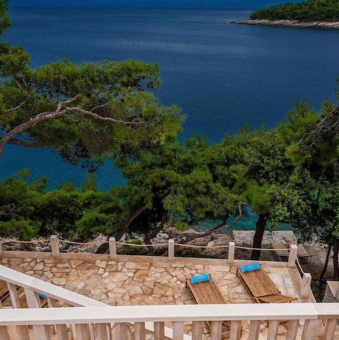 Slip straight from your private swim platform into the crystal clear sea