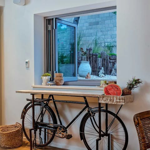 Admire quirky touches like the bike frame kitchen table
