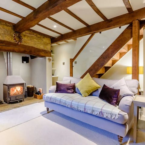 Snuggle up by the wood burner after a day exploring the Cotswolds