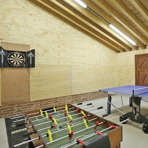 Enjoy some friendly competition with a game of darts, ping pong or table football