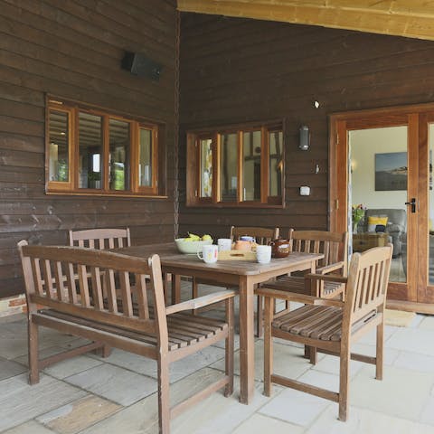 Dine alfresco on the shaded terrace while you admire the view