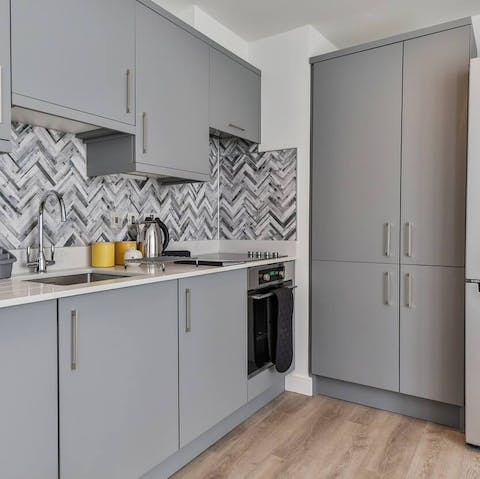 Rustle up breakfast in the sleek, modern kitchen area