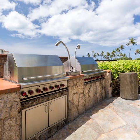 Gather together for a memorable meal around the shared barbecues