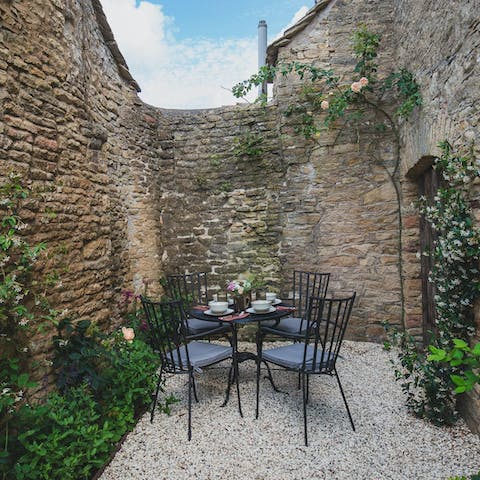 Enjoy a quiet morning coffee in the little courtyard