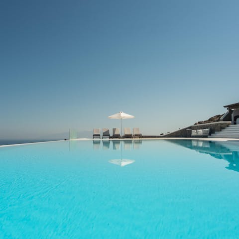 Relax by the pool in the hot Mediterranean sun