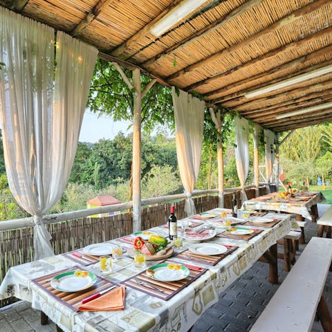Embrace Italian rusticana on the shaded dining terrace