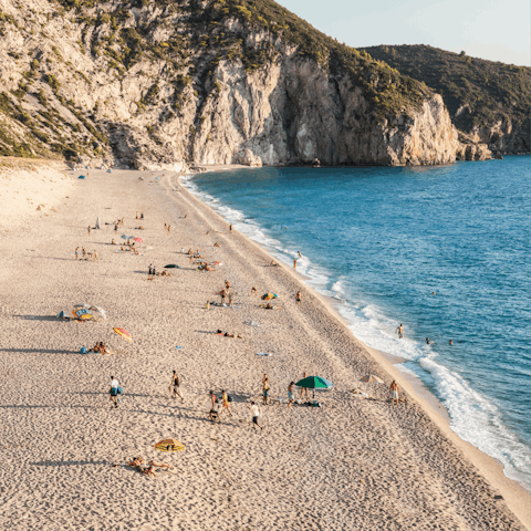 Take the short 5km drive to Vasiliki Beach and bob about in the clear waters