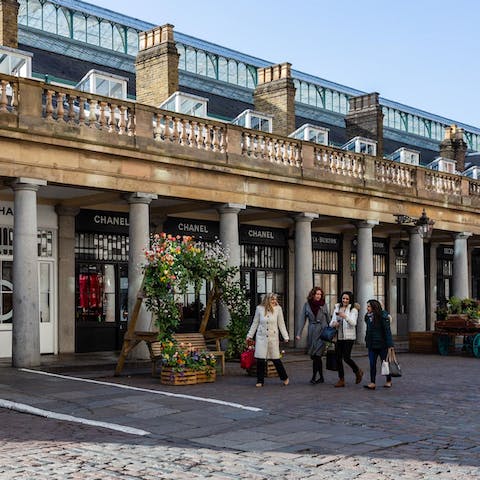 Indulge in some retail therapy at Covent Garden's boutiques, a fifteen-minute walk away 