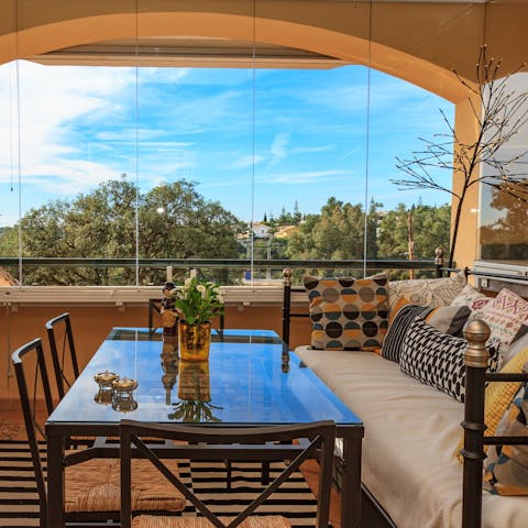 Snuggle up on the second terrace with a good book or just admire the views from the arched windows