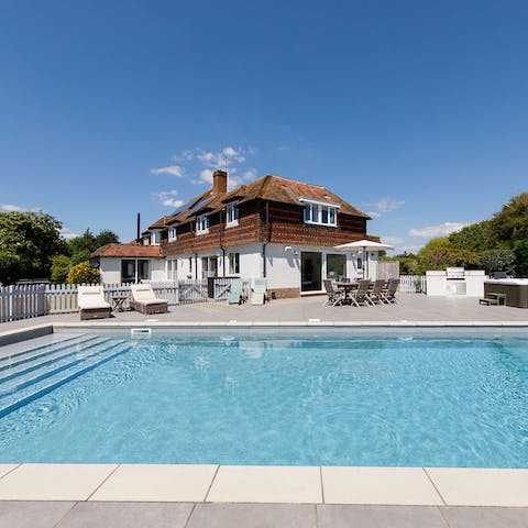 Spend lazy days making the most of the south coast's weather beside the glittering pool