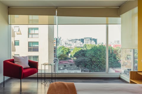 Let the light stream in through the floor-to-ceiling windows