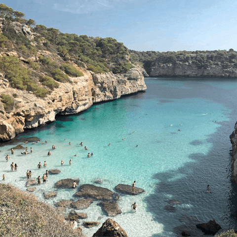 Swim in the crystal clear waters of nearby Calo des Moro
