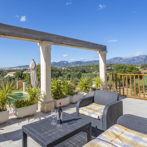 Pour yourself a glass of red and admire the Sierra de Tramuntana views on the terrace
