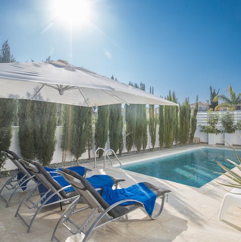 Relax by the pool with a choice of loungers and comfy chairs
