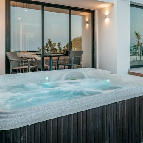 Enjoy a long and lovely soak in the hot tub at the end of fun days exploring the island