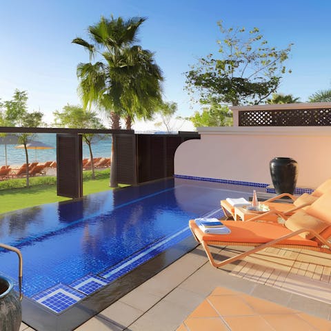 Stretch out by the private pool and soak up the sun