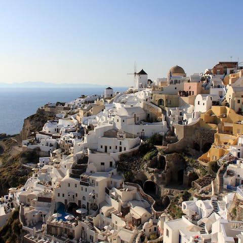 Explore beautiful Oia and its many historic sights – the Blue Domed Church is a three-minute walk away