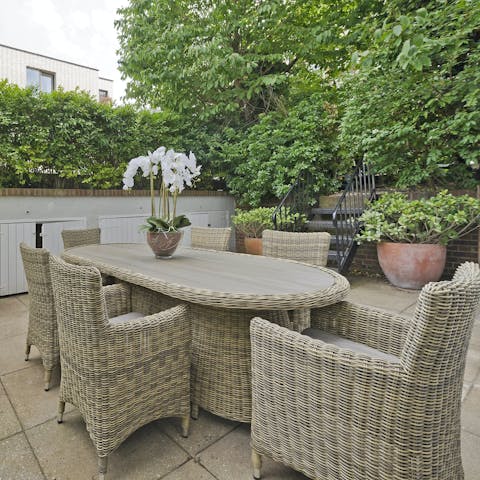 Enjoy cups of tea and plates of biscuits on the terrace