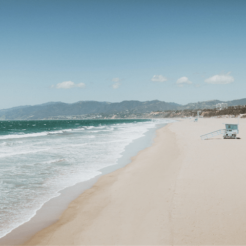 Catch the perfect tan at Santa Monica beach, located just fifteen-minutes from home
