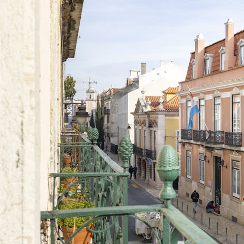 Watch over Lisbon's atmospheric streets from your Juliet balcony