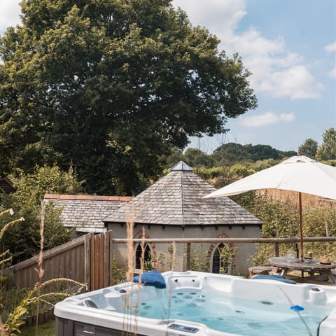 Unwind with a soak in the hot tub and then fire up the barbecue for lunch
