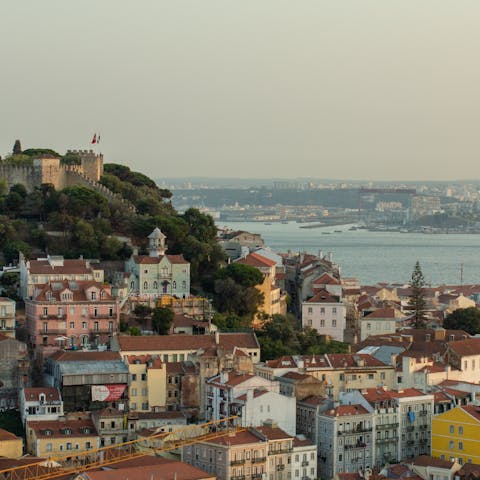 Take the short bus or train ride into the heart of Lisbon