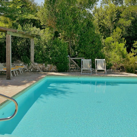 Swim gentle laps in the private heated pool