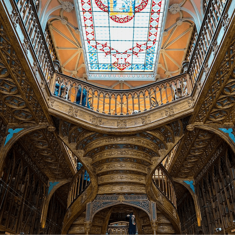 Stroll twenty minutes to bask in the magnificent Livraria Lello