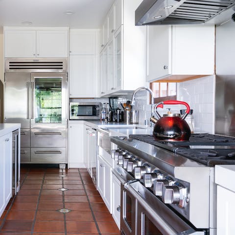 Flex your culinary muscles at home in the stylish chef's kitchen
