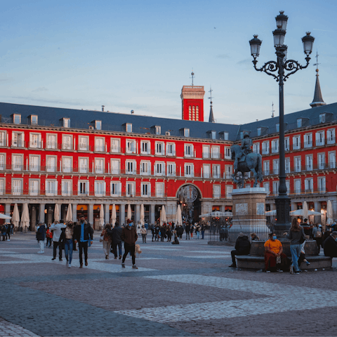 Soak up the ambience at Plaza Mayor, it's a ten-minute walk away
