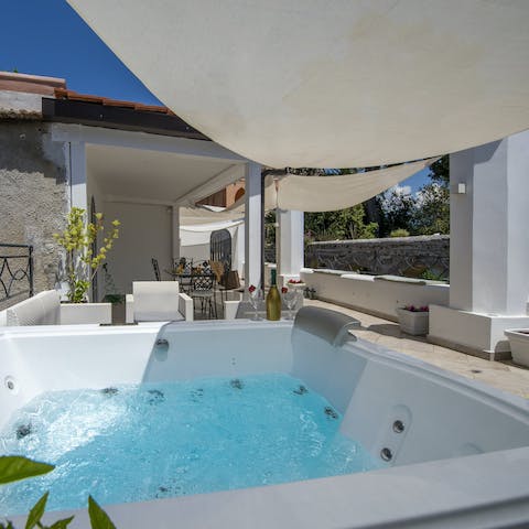 Slip into the terrace hot tub after a day of exploring