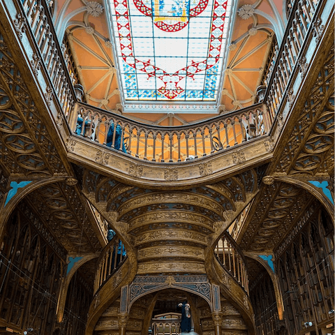 Visit the ornate Livraria Lello bookstore, a six-minute stroll from your door