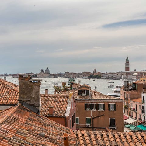 Drink in the views of Venice, including the iconic St Mark's Campanile