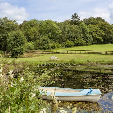 Canoe on or swim in the private spring-fed lake