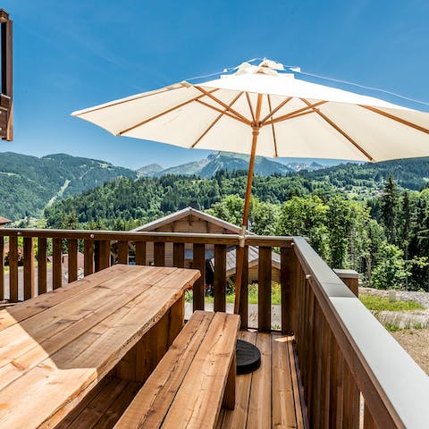 Take in the views of the Alps from the balcony