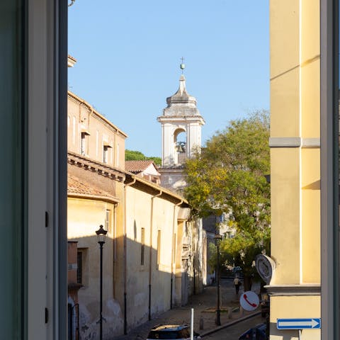 Admire the views from the bedroom of the Basilica of San Clemente