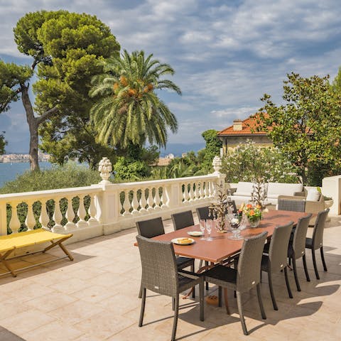 Enjoy dining alfresco on balmy summer nights with views out onto the Mediterranean Sea