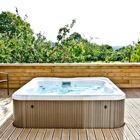 Soak your muscles in the outdoor hot tub after a long day out