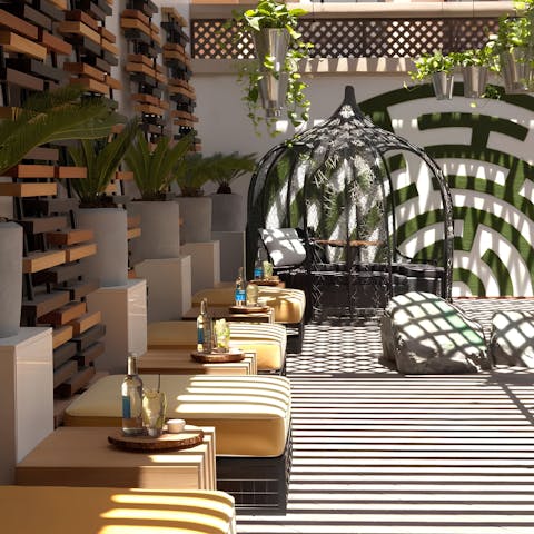 Sip a refreshing iced tea in the sun-dappled lounge