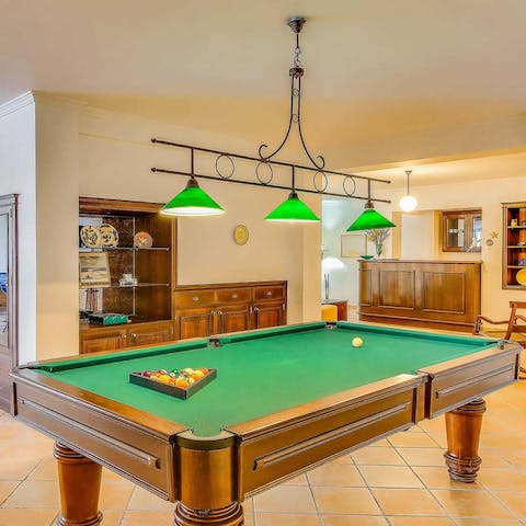 Enjoy endless rounds of pool in the games room
