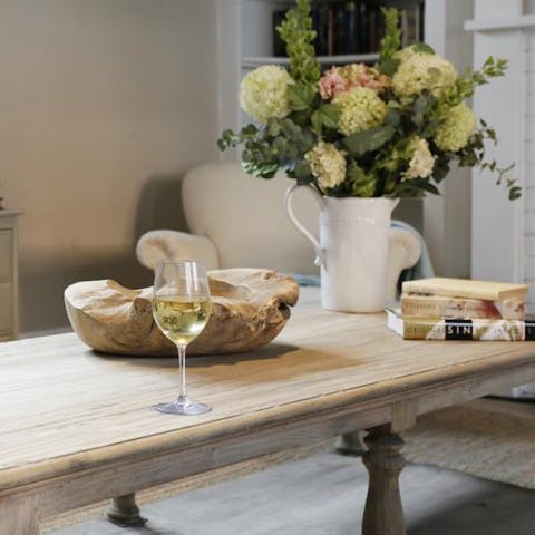 Sip a glass of wine by the fireplace as you read an Orwell novel