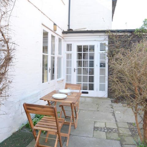 Dine alfresco on the patio on a sunny evening