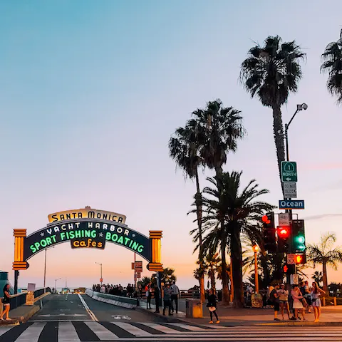 Cruise fifteen minutes down the coast to Santa Monica Pier