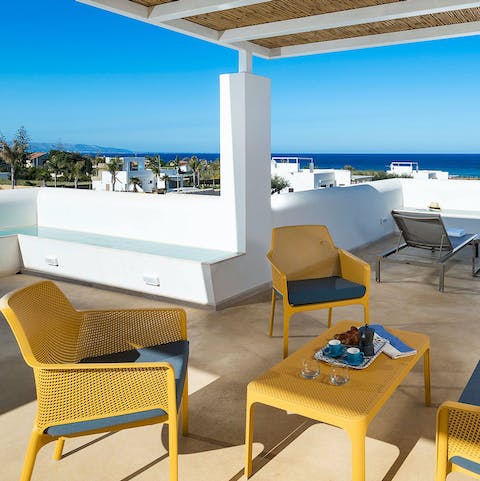 Sip your morning coffee on the rooftop terrace