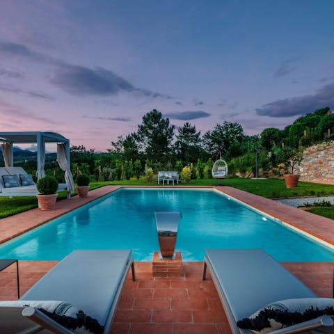 Dry off on a lounger after enjoying a swim in the private pool