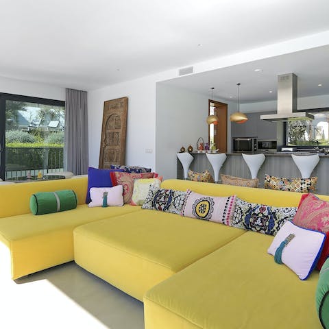 Chill out on the huge living room sofa, with direct access to the pool