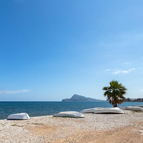 Make a beeline for Platja de l'Olla, 100 metres away