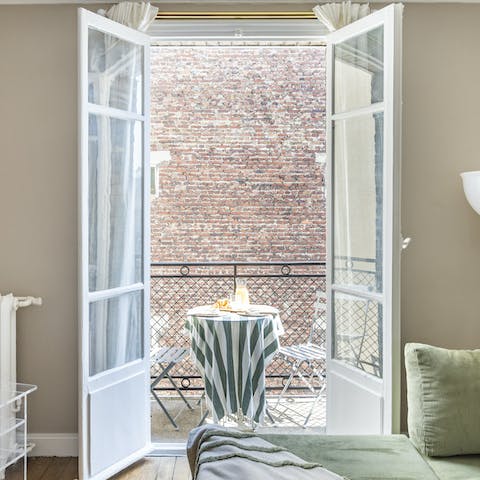 Pour a glass of your favourite drink and relax on the balcony